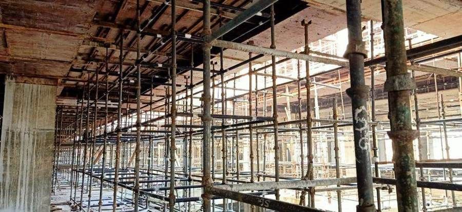 Shuttering and staging below the slab